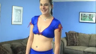 Brunette cheerleader enjoying vibrator on the couch