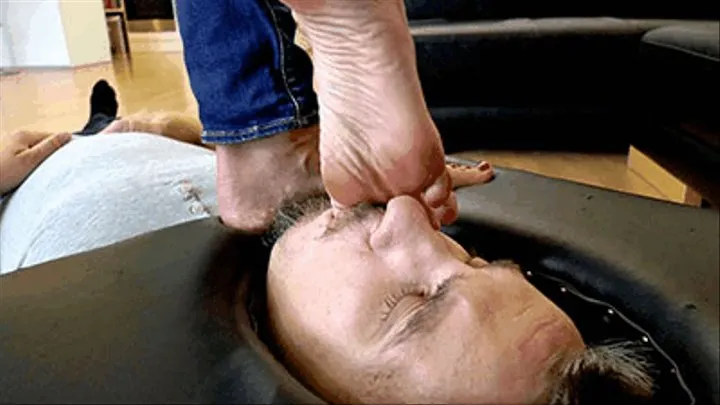 Foot licking slave locked in the smotherbox