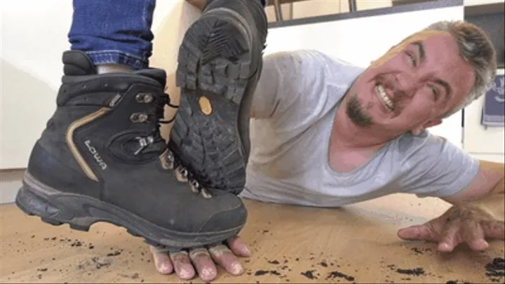 Dirty hiking boots destroy the slave's hands