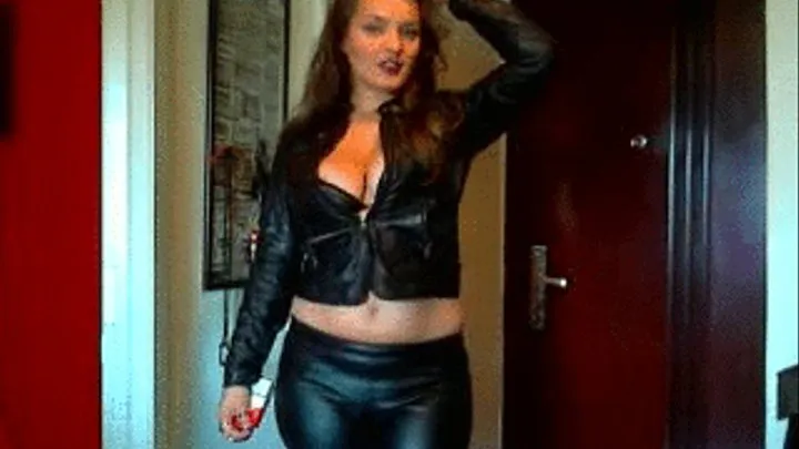 Eva, all in leather, smoking a marlboro