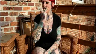 Redheaded Tatted Up Milf Smoker