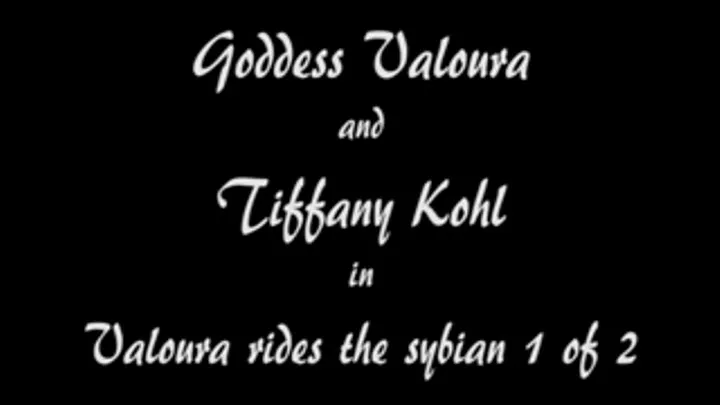 M100124 Goddess Valora and Tiffany Kohl in Valoura rides the sybian 1of2