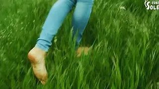 Walking barefoot and getting her sexy soles very dirty!