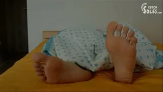 Tickling Eliška's big feet to wake her up