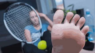 Relaxing her sweaty feet after a tennis match