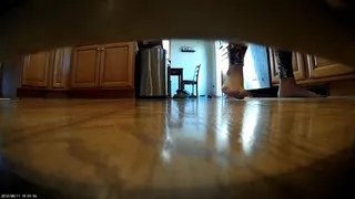 Barefoot walking around in the kitchen