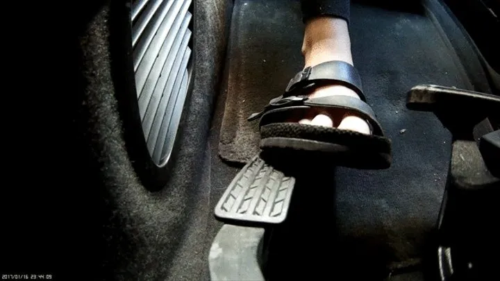 pedal pumping in old black rubber sandals