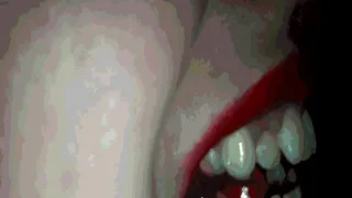 Between the giant teeth