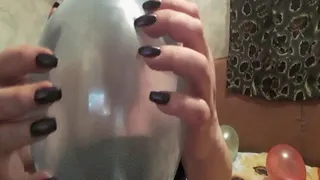 Long black nails and balloons