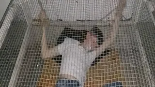 Boy in a cage