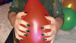 Black nails blow up balloons