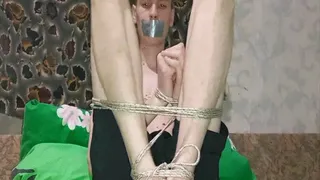 Boy wrestling with bondage