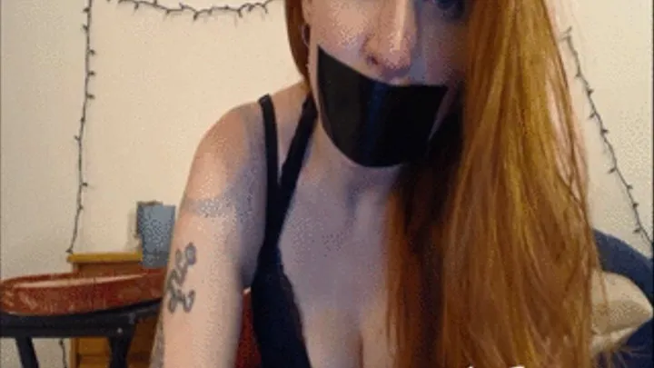 Sexy redhead duct tapes her mouth REQ