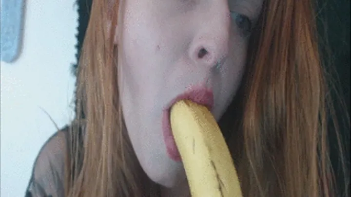 Sexy lips around a banana