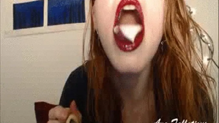 Redhead slides creamy yogurt down her throat( )