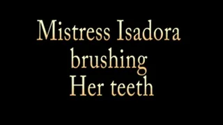 Mistress Isadora brushes Her teeth