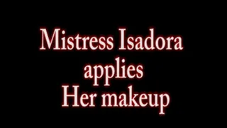 Mistress Isadora applies Her makeup
