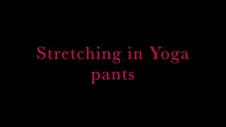 Stretching in yoga pants