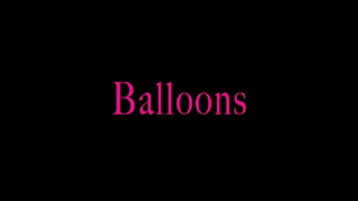 Mistress Isadora plays with balloons