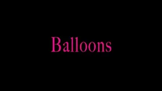 Mistress Isadora plays with balloons