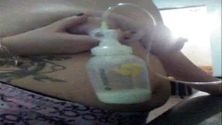 Lactating pregnant amateur Breast pumping my Big filled up tits filling up a bottle
