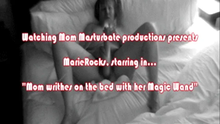 Step-Mom writhes on the bed with her Magic Wand,