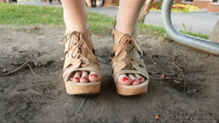 Under table feet - Long size 11 feet in sandals under a picnic table