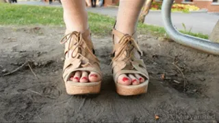 Under table feet - Long size 11 feet in sandals under a picnic table