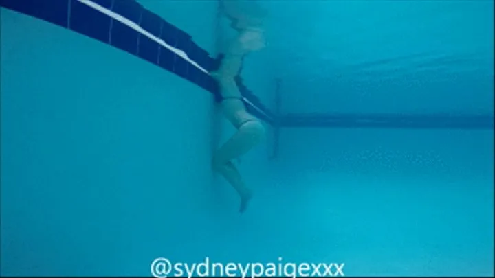 Sydney Paige flashes her tits and ass in a Public Pool!