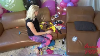 Anna with her new galaxy leggings under a balloon arch - Part Two