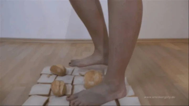 Sneaker Girl Walks Barefoot Over a Carpet of Bread