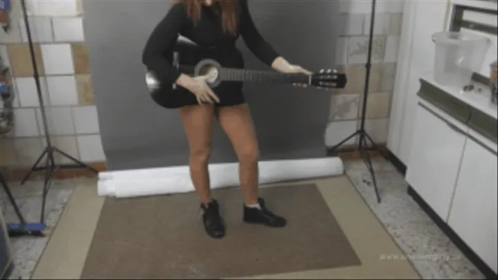 Sneaker-Girl Crushing a Guitar