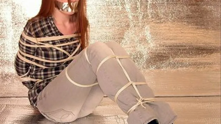 YOUNG REDHEADED BEAUTY IN BONDAGE