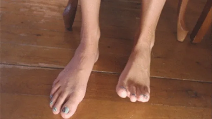 Feet on the wooden floor