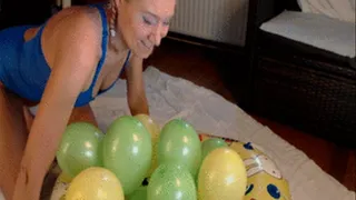 Laying and sitting on balloons