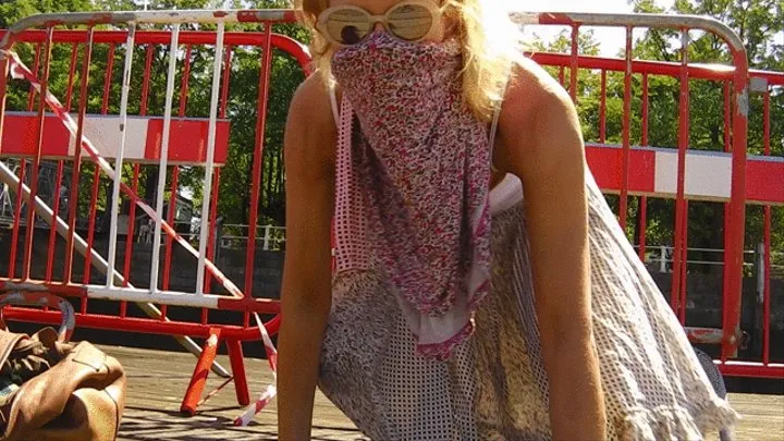 Masked exhibitionist at the river bank