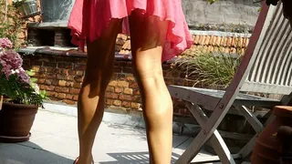 Upskirt in pink dress