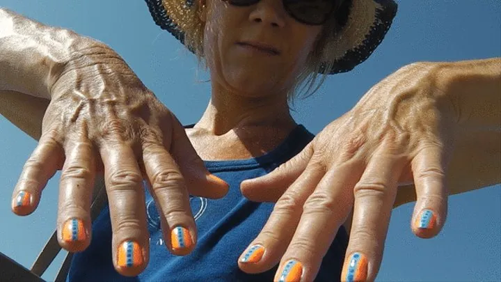 Veins with blue and organge nails