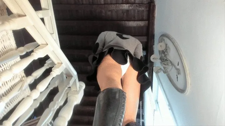 Checking my phone on the stairs