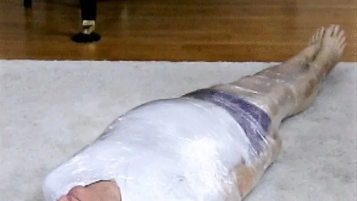 Facesitting the Plastic Wrapped Victim