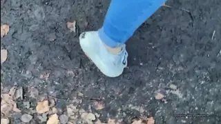 a walk in the forest with used Sneakrs in the dirt