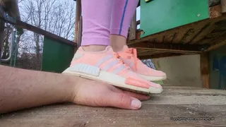 hand trample in cute used Adidas nmd sneakers