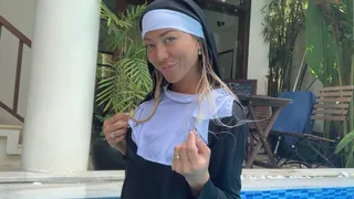 Naughty nun swimming in her full outfit