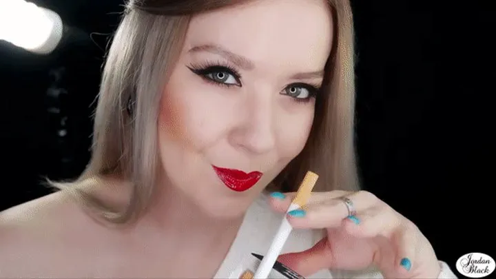 Close-up glossy ultra red lips on a Marlboro