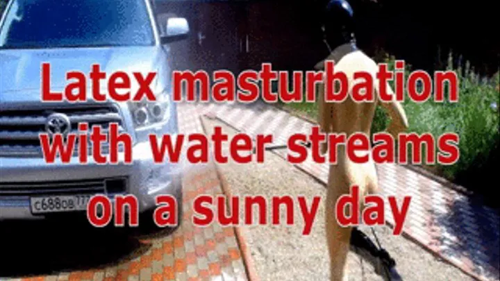 Latex masturbation with water streams on a sunny day