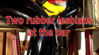 Two rubber lesbians at the bar