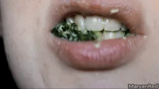 Chewing food - Close-up of my mouth eating spinach and egg salad
