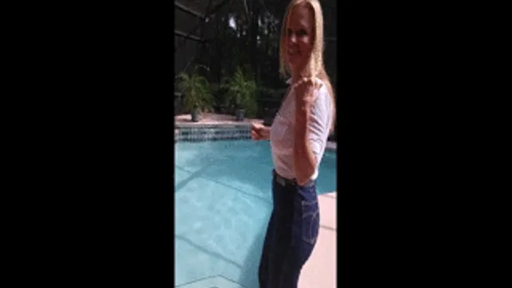 Sarah swims in pool in sasson jeans and boots