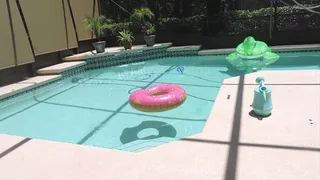 Missy in Long Denim skirt and boots in swimming pool