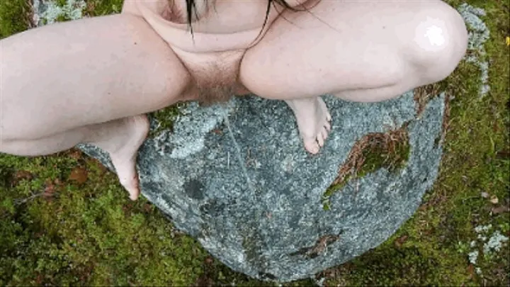 Peeing Sitting On A Rock